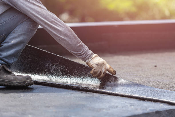 Professional Basement Waterproofing technician working in Hartville, OH